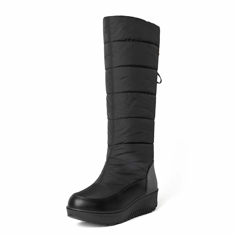 Plush waterproof snow boots with fringe and wedge