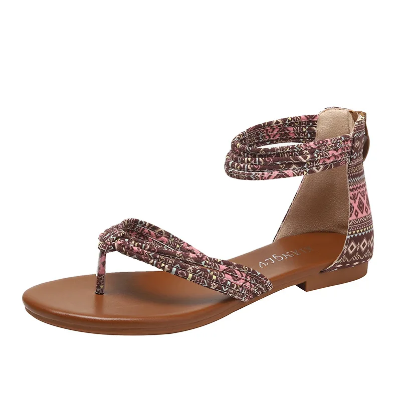 Beige flat sandals with mid-calf strap