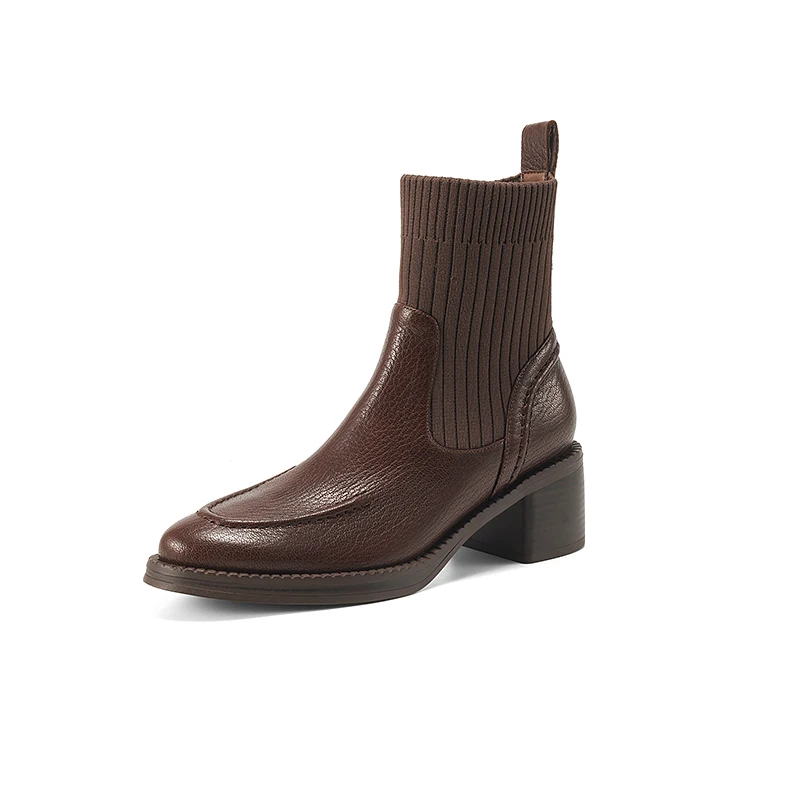 Ankle high stretch leather boots with thick heels