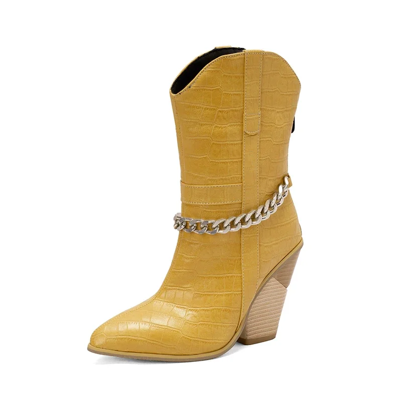 Ankle boots with pointed toe and metal chain detail