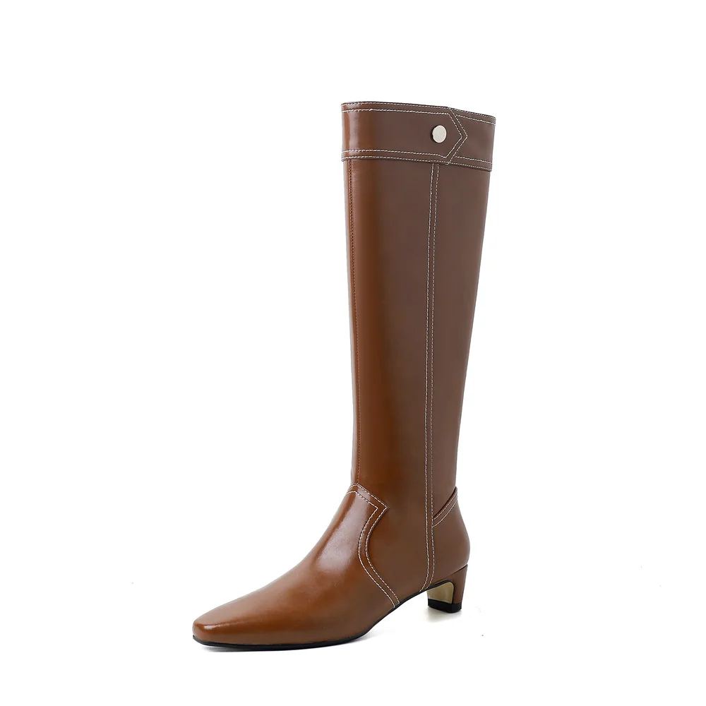 Elegant knee high leather boots with kitten heels