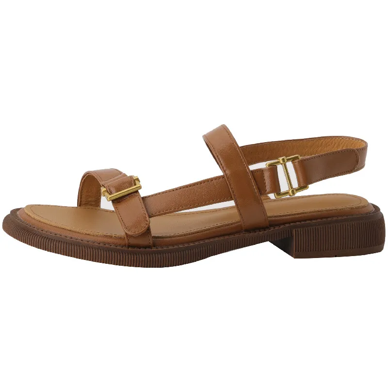 Genuine leather summer sandals with metal decoration and low heels