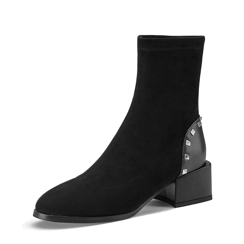 Black ankle boots with square heels and rivets